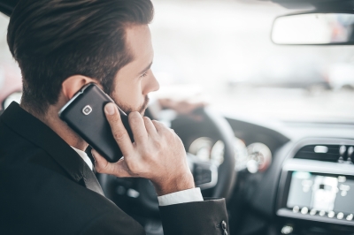 Man on Phone in Car