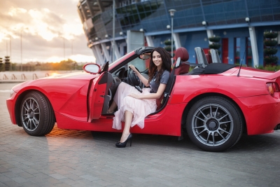 Woman in Red Convertible